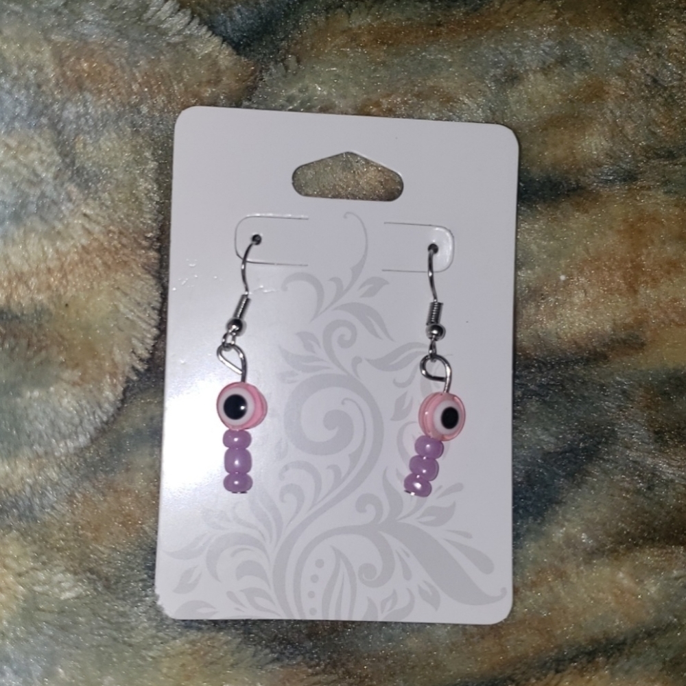 Pink evil eye earrings